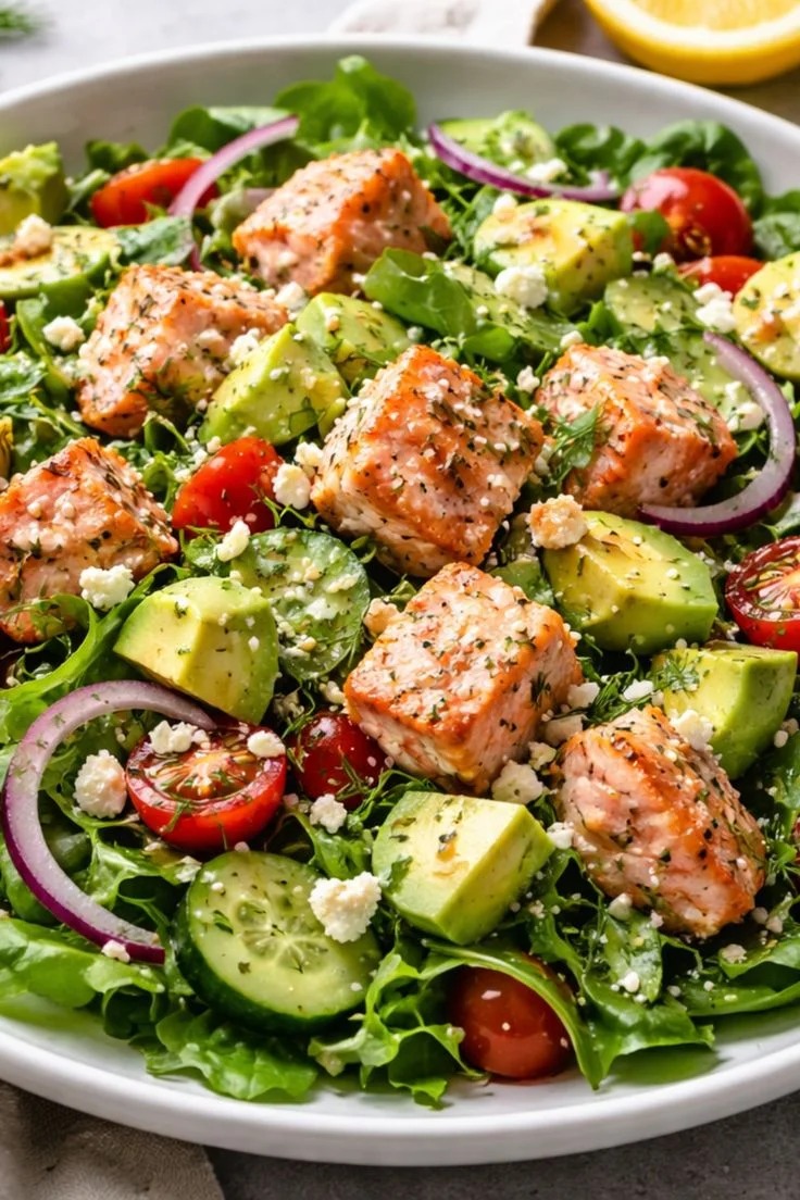 Mediterranean avacado salmon salad with fresh lemon dill dressing