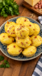 Ham and cheese egg muffins with fluffy eggs, melted cheese, and diced ham