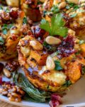 Sweet Potato Rosti Muffins with zucchini, butternut squash, feta, spinach, pine nuts, cranberries, and sage brown butter