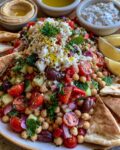 Mediterranean Chickpea Feta Salad with chickpeas, feta, cucumber, tomatoes, olives, fresh herbs, and lemon dressing