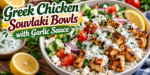 Greek Chicken Souvlaki bowls with grilled chicken, rice, cucumber, tomatoes, feta, fresh herbs, lemon, and creamy garlic sauce